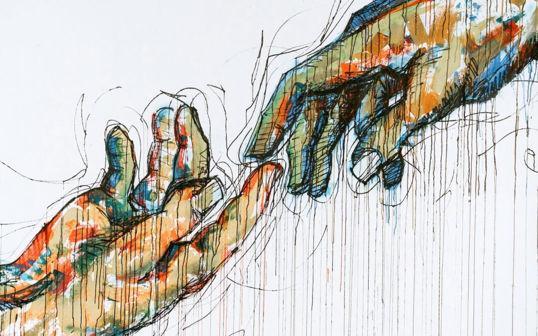 A colorful drawing of two hands touching forefingers. The main colors of the hands are beige, orange, blue, and green. There are black pen lines outlining the hands and running down the image.